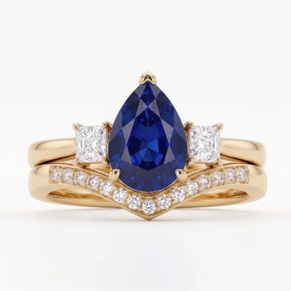 Pear Cut Royal Blue Sapphire Three Stone Chevron Bridal Set