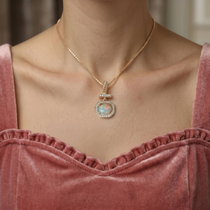 Bezel-Set Cushion Opal Pendant with Diamond Bar and Twisted Bail